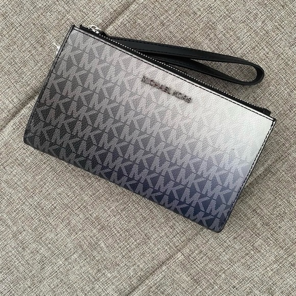 Michael Kors Handbags - Michael Kors Jet Set Large Ombre Black Multi and white Signature Wristlet